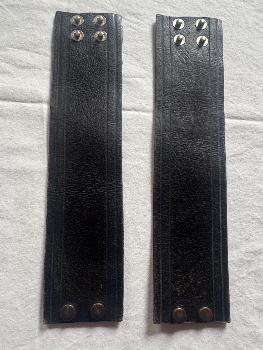 Leather wrist straps with snaps 9”long x 2 1/4” wide